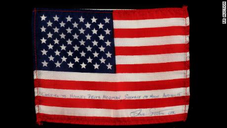 A small American flag that traveled to the moon with the Apollo 15 astronauts sold for $31,251.