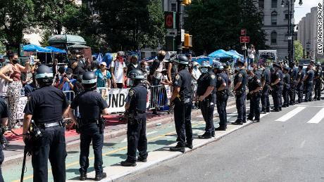 Woman arrested after NYPD chief and 3 officers injured following clash with protesters