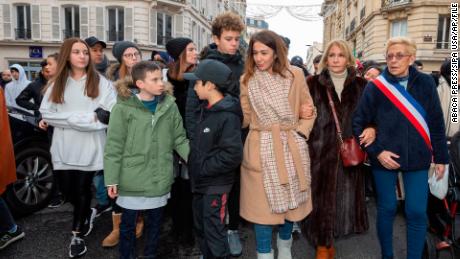 Cedric Chouviat&#39;s widow Doria and her children take part in a march in Levallois, near Paris, on January 12, 2020.