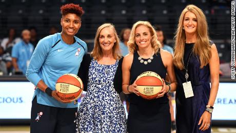 Angel McCoughtry #35 (left) of the Atlanta Dream is recognized for reaching 5,000 career points with Head Coach Nicki Collen and Atlanta Dream co-owners Mary Brock and Kelly Loeffler (far right)before the game against the Minnesota Lynx on May 29, 2018 at McCamish Pavilion in Atlanta. 