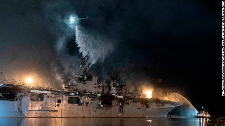 A US Navy helicopter combats a fire aboard the amphibious assault ship USS Bonhomme Richard on July 14. 