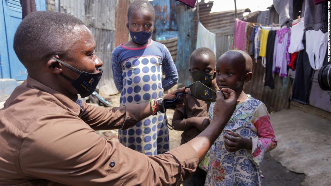 &lt;strong&gt;Kenya: &lt;/strong&gt;Members of local organizations led by Gerald Anderson (left) visited families in Nairobi&#39;s Mathare slums to donate face masks and food.