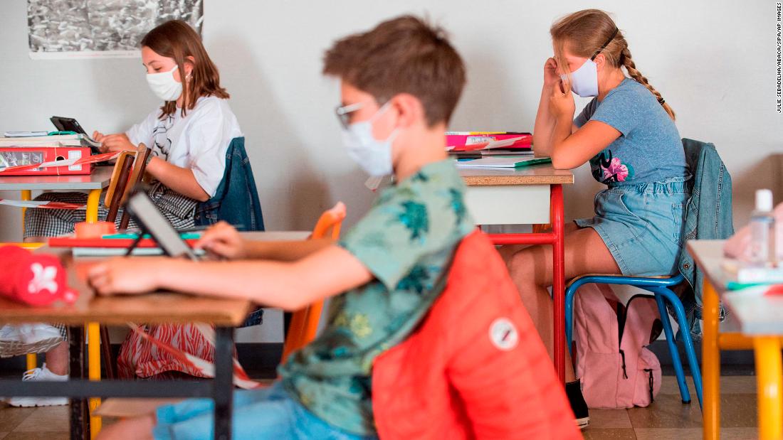 &lt;strong&gt;France: &lt;/strong&gt;Pupils wearing fabric masks listen to their teacher as they respect social distancing on June 2 in Beaucamps-Ligny, near Lille. Secondary schools in Hauts de France were gradually reopening after pandemic restrictions were lifted.
