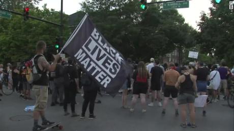 Chicago protesters rally at mayor's house a day after clashes with police