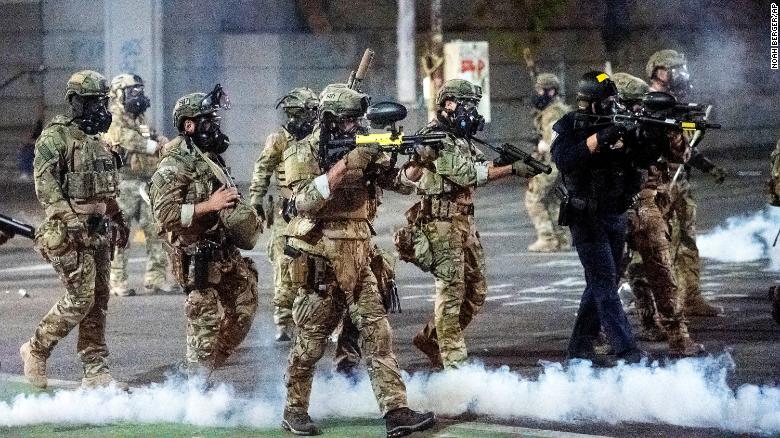 Federal agents use crowd control munitions to disperse Black Lives Matter protesters in the US city of Portland, Oregon, on July 20, 2020.