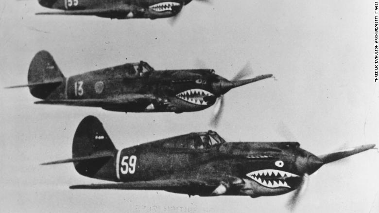 American Volunteer Group aircraft flying in tight formation during World War II.