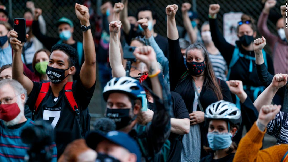 People join a rally at Portland&#39;s Justice Center on July 17.