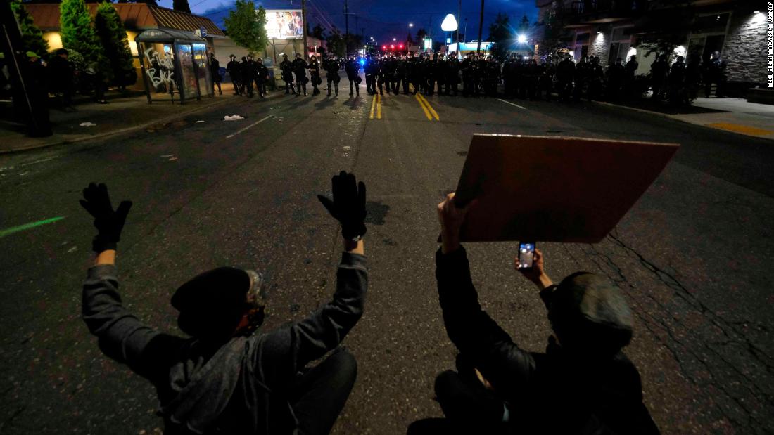 Protesters face off with police on June 30.