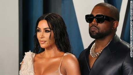 Kim Kardashian (L) and husband US rapper Kanye West attend the 2020 Vanity Fair Oscar Party following the 92nd Oscars at The Wallis Annenberg Center for the Performing Arts in Beverly Hills on February 9, 2020. (Photo by Jean-Baptiste Lacroix / AFP) (Photo by JEAN-BAPTISTE LACROIX/AFP via Getty Images)
