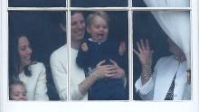 Prince George is held by his nanny, Maria Teresa Turrion Borrallo, during the Trooping the Colour ceremony in June 2015.