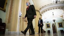 Senate Majority Leader Mitch McConnell, a Republican from Kentucky, wears a protective mask as he arrives to deliver opening floor remarks in the U.S. Capitol on July 22, 2020.