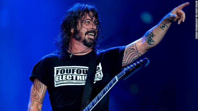 US singer and guitarist Dave Grohl of the Foo Fighters performs onstage during the Rock in Rio festival at the Olympic Park, Rio de Janeiro, Brazil, on September 28, 2019.