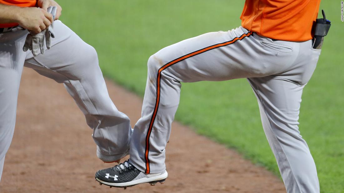 Baltimore&#39;s Chris Davis, left, and Austin Hays tap feet after Hays hit a home run during training on July 8.