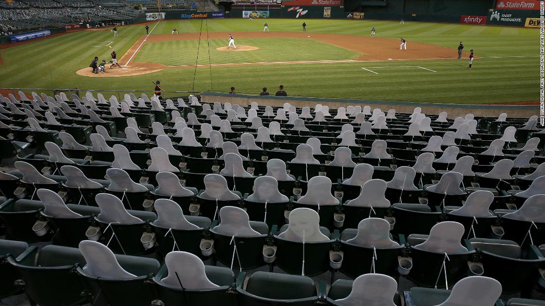 Fan cutouts are seen at the Oakland Coliseum as the Oakland Athletics play the San Francisco Giants in an exhibition game on July 20.