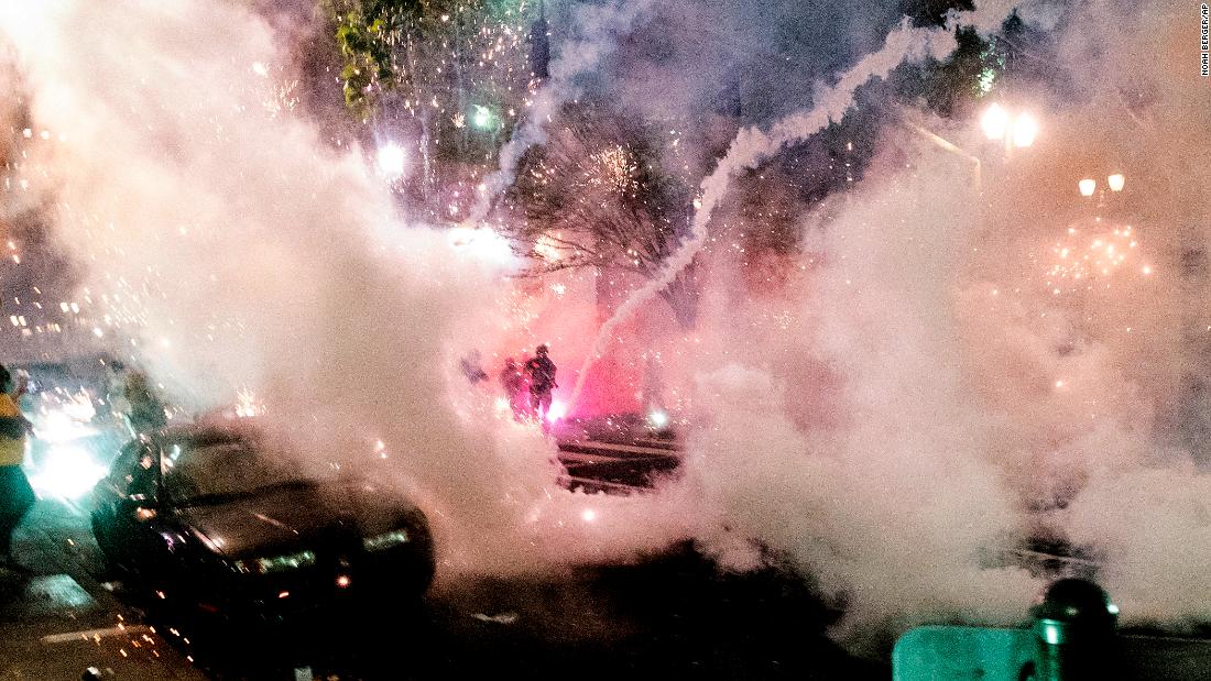 Smoke fills the area as federal officers try to disperse protesters on July 22.