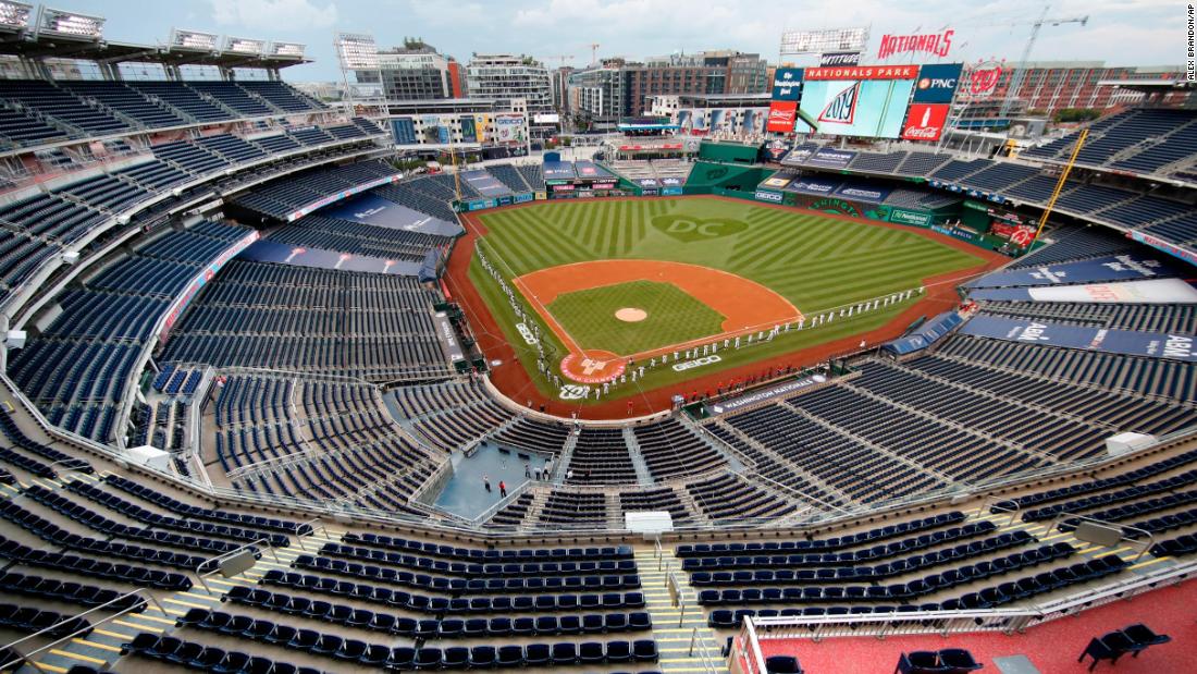 The Washington Nationals and the New York Yankees line up on the field prior to Major League Baseball&#39;s season-opening game on Thursday, July 23.