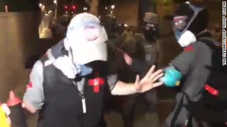 Policing tactics under fire as video shows medics in Portland getting shoved to the ground 