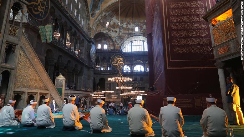 Worshipers join a prayer program at Hagia Sophia ahead of the first Friday prayers there in 86 years.