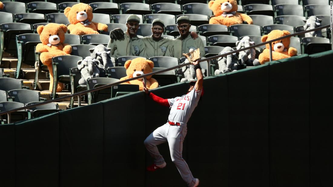 Michael Hermosillo of the Los Angeles Angels catches a fly ball during a game in Oakland, California, on Saturday, July 25.