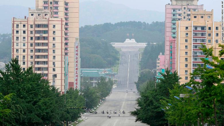 People make their way in the North Korean city of Kaesong in this file photograph from July 23, 2019.