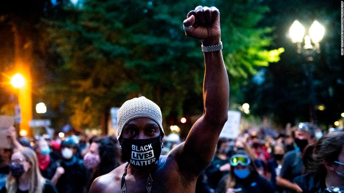 A protester raises a fist on July 25.