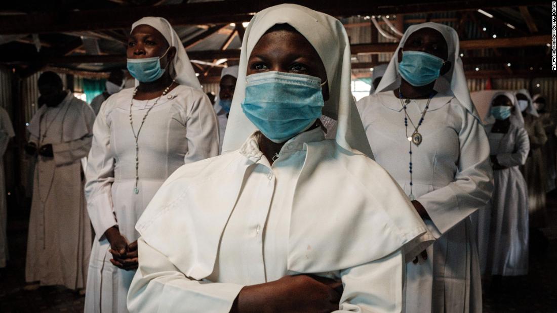 Worshippers of Legio Maria attend a prayer at their church in Nairobi, Kenya, on July 26. Places of worship have reopened in Kenya under strict guidelines.