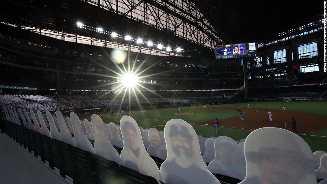Cardboard cutouts of fans are seen in Globe Life Field during a Major League Baseball game in Arlington, Texas, on July 24. &lt;a href=&quot;http://www.cnn.com/2020/07/22/us/gallery/baseball-begins-2020/index.html&quot; target=&quot;_blank&quot;&gt;The league has resumed&lt;/a&gt; for a 60-game abbreviated season, but fans are not allowed to attend.