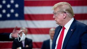 TOPSHOT - US President Donald Trump tours a Honeywell International Inc. factory producing N95 masks during his first trip since widespread COVID-19 related lockdowns went into effect May 5, 2020, in Phoenix, Arizona. (Photo by Brendan Smialowski / AFP) (Photo by BRENDAN SMIALOWSKI/AFP via Getty Images)