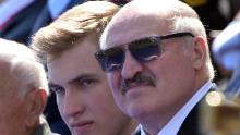 Lukashenko with his son Nikolai during the Victory Day military parade marking the 75th anniversary of the victory in World War II, on June 24, in Moscow, Russia.