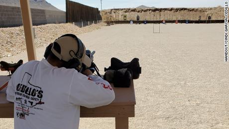 Rafael Cedillo, owner and instructor of Cedillo&#39;s Firearm Traning Safety &amp; More, demonstrates the use of a firearm during a safety course at Ysleta Tactical Ranch in El Paso, Texas.