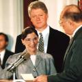 WASHINGTON, DC - AUGUST 10:  Chief Justice of the U.S. Supreme Court William Rehnquist (R) administers the oath of office to newly-appointed U.S. Supreme Court Justice Ruth Bader Ginsburg (L) as U.S. President Bill Clinton looks on 10 August 1993. Ginsburg is the 107th Supreme Court justice and the second woman to serve on the high court.  (Photo credit should read KORT DUCE/AFP via Getty Images)