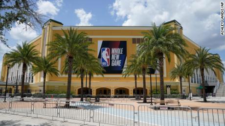 An NBA sign is posted on a basketball arena at ESPN Wide World of Sports Complex Wednesday, July 29, 2020, in Orlando.