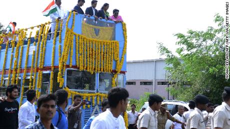 Swelling with pride: Sindhu (2R) is given a hero&#39;s welcome in Hyderabad with people lining the streets from the Aiport to the Gopichand Badminton Academy