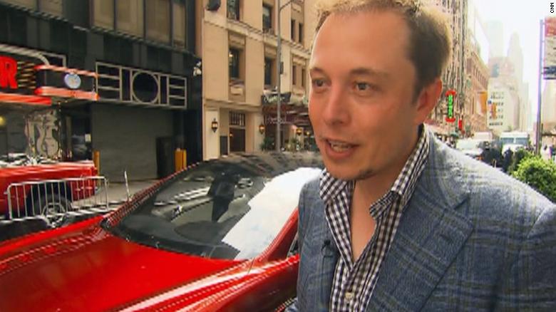 Elon Musk in front of the Nasdaq stock exchange on the day of Tesla&#39;s IPO.