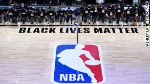 Nba Resumes Jazz And Pelicans Players Took A Knee Before Kicking Off The League S Reopened Season Cnn