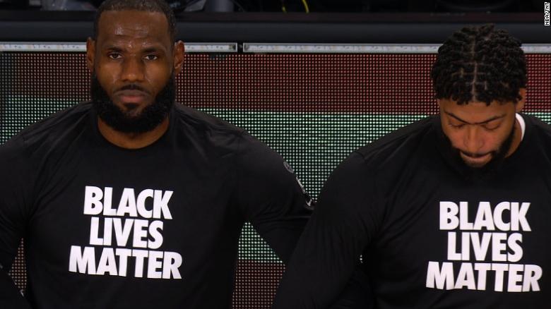 See LeBron James and all NBA players kneel during National Anthem