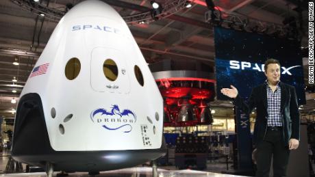 Elon Musk introducing SpaceX&#39;s Dragon V2 spacecraft in Hawthorne, California on May 29, 2014, with plans to ferry NASA astronauts to and from the space station. (Photo Robyn Beck/AFP/Getty Images)