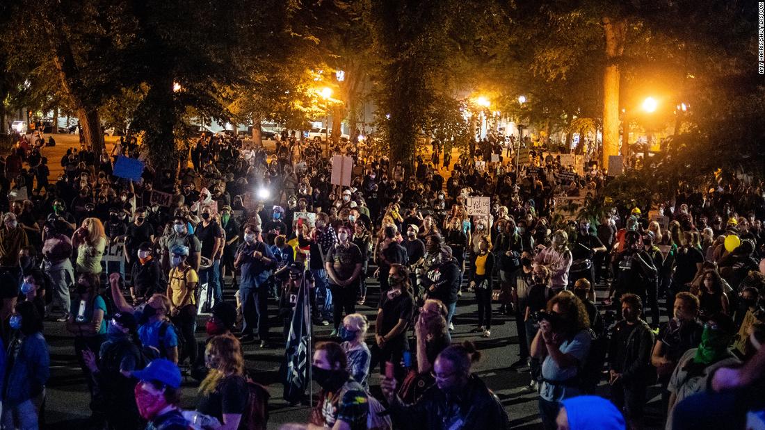 Protesters gather at the Justice Center and federal courthouse on July 31.