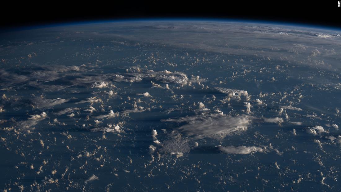 Sunrise casts long shadows from the clouds across the Philippine Sea as the International Space Station orbited about 200 miles east of Taiwan on July 13.