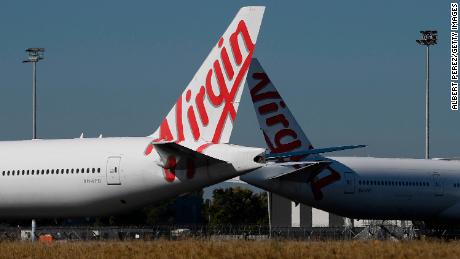 Virgin Australia cuts 3,000 jobs and plans to focus on shorter flights