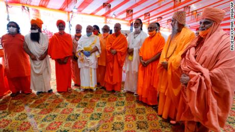 Hindu priests gather for a groundbreaking ceremony of a temple dedicated to the Hindu god Ram in Ayodhya, India, Wednesday, Aug. 5, 2020.