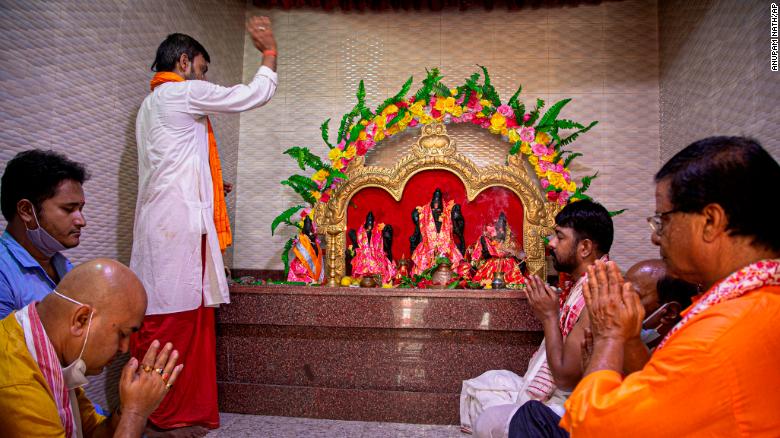 Hindus perform special prayers to mark the groundbreaking ceremony of a temple dedicated to the Hindu god Ram in Ayodhya, in Gauhati, India, August 5, 2020. 