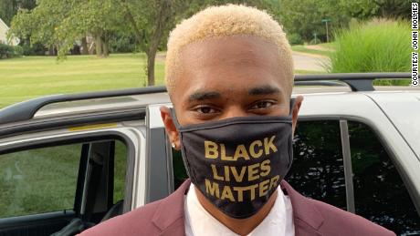 Dean Holmes was told to take off his Black Lives Matter mask at his high school graduation ceremony.