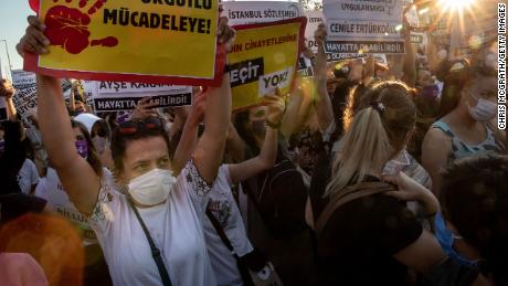 Wearing protective masks, women lined the streets of Istanbul to protest.