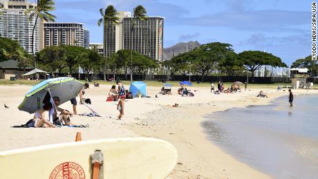 Hawaii reinstates inter-island travel quarantine and other restrictions as Covid-19 cases surge 