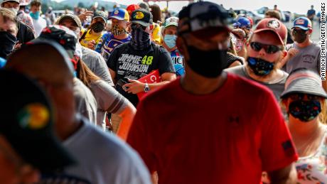 Fans wearing face masks and face masks will enter the racetrack ahead of the NASCAR Cup Series All-Star Race at the Bristol Motor Speedway on July 15, 2020 in Bristol, Tennessee.