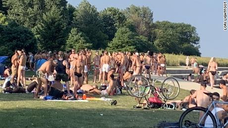 In a photo posted to Twitter by Chicago Mayor Lori Lightfoot, a crowd of people is seen gathering at Montrose Beach Saturday.