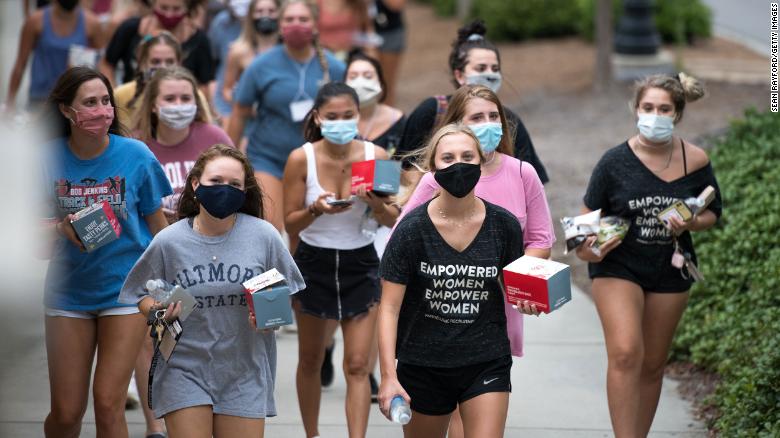 College students walk to dinner this week at the University of South Carolina in Columbia. 