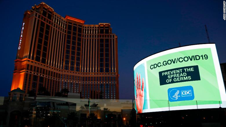 A sign advises people to minimize the spread of germs along the Las Vegas Strip, devoid of the usual crowds during the coronavirus outbreak.