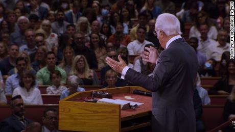 Pastor John MacArthur speaks during a July 26 service at Grace Community Church. CNN has blurred a portion of this image to protect a child&#39;s identity. 